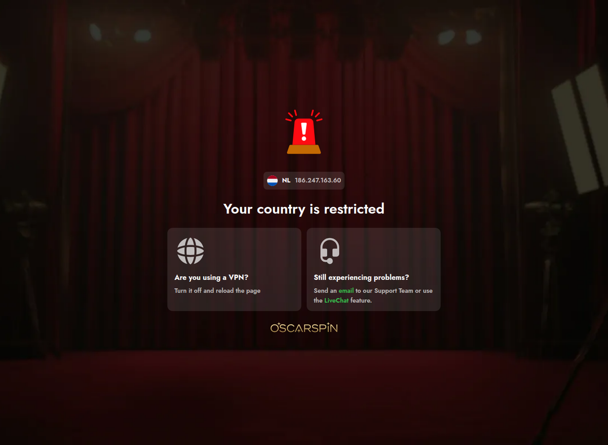 شاشة OscarSpin التي تحجب الزائر وتقول Your country is restricted مع إظهار عنوان IP وبلده